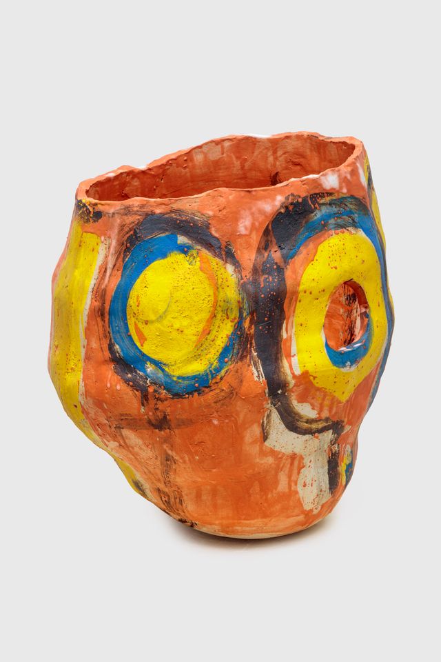 Image of artwork titled "Orange, Yellow Face, 2 holes" by Roger Herman