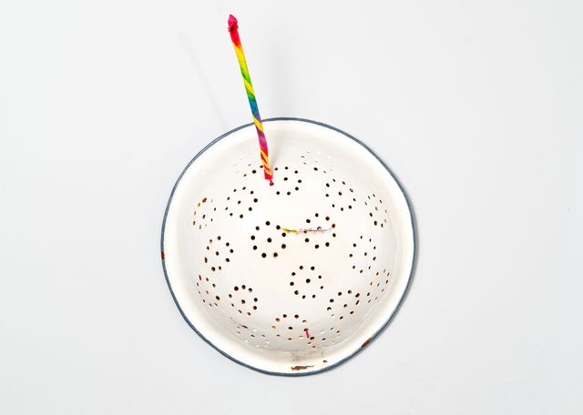 Image of artwork titled "Colander with sparkler and fake braces" by Tamara Johnson