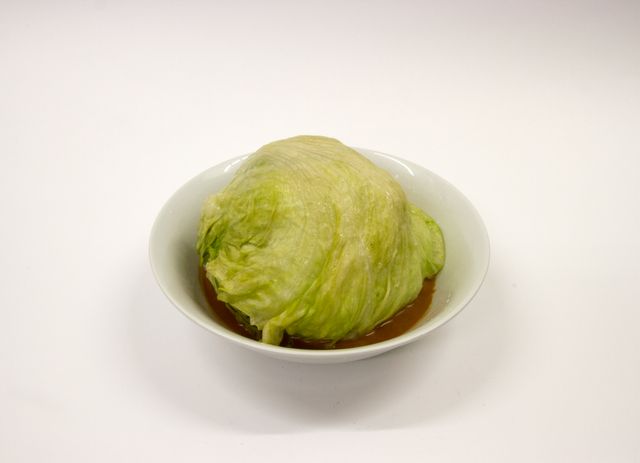 Image of artwork titled "Boiled Iceberg Lettuce with Sichuan Pepper Sauce" by Kasper Hesselbjerg