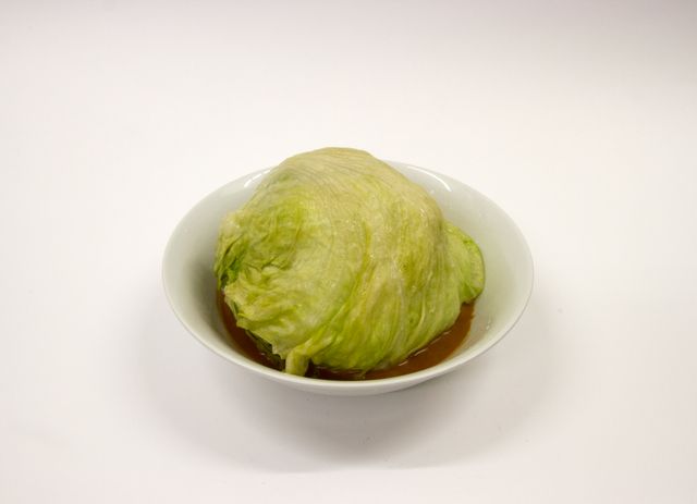 Image of artwork titled "Boiled Iceberg Lettuce with Sichuan Pepper Sauce" by Kasper Hesselbjerg