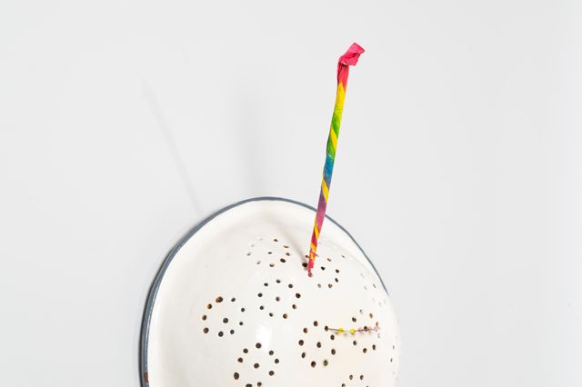 Image of artwork titled "Colander with sparkler and fake braces" by Tamara Johnson